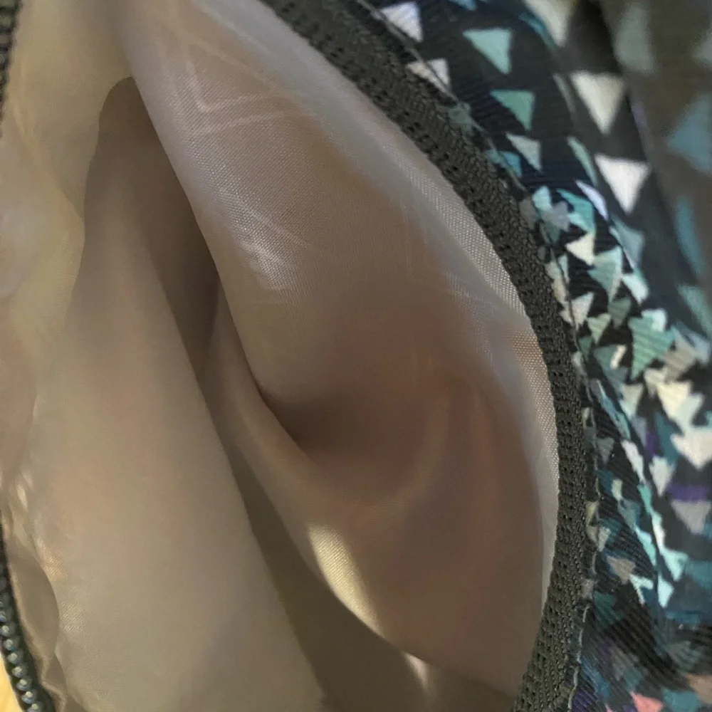 Stylish Blue and Black Geometric Backpack with Reflective Finish